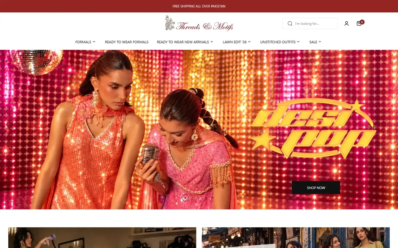 Threads & Motifs store homepage on desktop